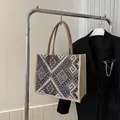 Ethnic style cotton linen tote bag featuring colorful geometric woven patterns - Black