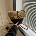 Handwoven straw crossbody bag in dual-tone brown and black with a pearl closure - Wave Texture (Style 1 Khaki) / Khaki