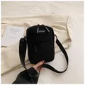 Japanese style black corduroy crossbody phone bag with adjustable nylon strap and logo - Black