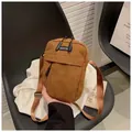 Vintage brown corduroy crossbody phone bag with adjustable strap and front zipper - Brown
