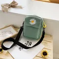 Bean green daisy canvas crossbody bag with white embroidery and adjustable strap - Green