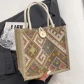 Detail of colorful geometric woven linen tote with white cotton handles and wooden button - Button Decor Style / Khaki