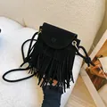 Retro black faux suede crossbody bag with long tassels and gold-tone hardware - Black