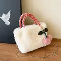 Chic fluffy cream faux fur small square handbag with pink twisted handle and cherry charm - White