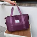 Fashionable dark purple waterproof travel bag with large capacity and shoe compartment - Fuschia