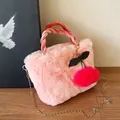 Pink faux fur crossbody bag with chain strap and cute plush cherry charm accessory - Pink