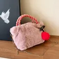 Pink fluffy faux rabbit fur handbag with woven handle and gold chain strap detail - Deep Pink