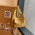Minimalist ginger yellow canvas tote bag with front pocket and top handles in casual style - No Pendant / Brown