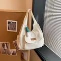 Minimalist beige canvas tote bag with front pocket and green plush pendant - With Pendant / White