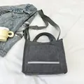 Dark gray corduroy tote bag with reflective strap and adjustable shoulder carry - Gray