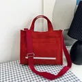 Red corduroy tote bag with adjustable shoulder strap and striped texture for women - Red