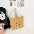 Mini ginger corduroy tote bag featuring a cute 3D teddy bear patch and magnetic snap - Khaki