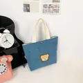 Blue corduroy mini tote bag with cute bear embroidery and cream white handles - Blue