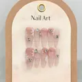 Detail of pink gradient press-on nails with 3D floral art and luxury rhinestone accents - Extra Small (XS) / 1459 Long Almond