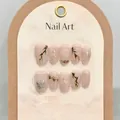Detail of handmade press-on nails with red berries, green leaves, and butterfly design - Extra Small (XS) / Mid Round Style