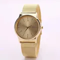 Elegant gold mesh strap watch with quartz movement and minimalist numbered dial face - Gold Single Watch