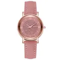 Macro detail of starry rose gold watch face with roman numerals and pink leather strap - Pink
