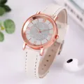 Detail of rose gold quartz watch with rhinestone dial and white leather strap - White