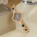 Montre à quartz luxe trèfle or rose avec incrustations noires et détails en cristal - Noir