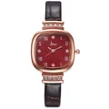 Close-up of square red watch face with rose gold Roman numerals and leather strap - Watch Only / Red