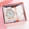 Detail of rose gold watch with grey leather strap and crystal bracelet in gift box - Light Blue + Bracelet + Box