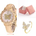 Détail d'une montre papillon dorée avec cadran en strass et ensemble de bracelets - Montre Bracelet Et Boîte Kaki