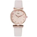 Detail of rose gold watch with geometric dial and white leather strap with bow charm - Beige