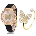 Détail d'une montre à quartz avec cadran papillon et ensemble de bracelet doré assorti - Noir + Bracelet