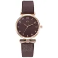 Close-up of elegant women watch with brown leather strap and rose gold metal dial - Brown