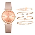 Coffret montre en similicuir rose scintillant et quatre bracelets dorés roses pour femme - Combinaison de Montres et d'Accessoires / Or rose