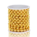 Polished golden stainless steel bead chain wound on a white spool for DIY jewelry - Regular Style / Gold