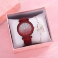 Close-up of a red starry dial watch and twin heart bracelet set in a pink gift box - Watch+Bracelet+Box / Red