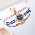 Detail of peacock green watch with leaf-shaped crystals and adjustable pull chain - Blue