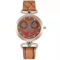 Detail of owl face watch dial with crystals, blue hands and brown leather strap - Watch (290) / Brown
