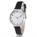 Women's quartz watch with black leather strap and silver case featuring a heart motif - Black