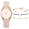 Dettaglio set orologio da donna rosa con quadrante floreale e bracciali coordinati - Orologio con Bracciale / Rosa