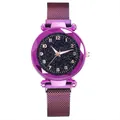 Detail of purple starry sky watch dial with faceted glass and magnetic mesh band - Purple