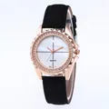 Detailed macro view of a rose gold watch bezel with high-density sparkling crystals - Black