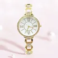 Elegant gold quartz watch with rhinestones and Roman numerals on a soft pink background - Gold
