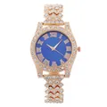 Detail of rose gold rhinestone watch featuring a blue dial with Roman numeral indices - Rose Gold Case Blue Dial