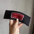 Détail du bandeau de sport tricoté noir avec lettrage Strive Power style pixel - Noir