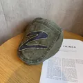 Detail of vintage olive green flat cap with Z patch and Boston embroidery on cotton fabric - M (55-59cm) / Army Green