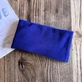 Detailed close-up of dark blue knitted headband showing thick loopy fabric texture - Dark Blue