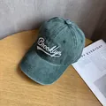 Detail of vintage washed green cotton baseball cap with white Brooklyn embroidery - Green