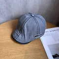 Macro shot of washed gray cotton newsboy cap featuring vintage distressed embroidery detail - M (55-60cm) / Gray