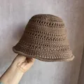 Detail of coffee brown crochet knit bucket hat showing hollow breathable patterns - M (55-58cm) / Coffee