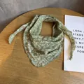 Detail of dark green floral headscarf with delicate white crochet lace edge trim - Green