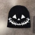 Close-up of black fuzzy knit hat with white skull face pattern for Halloween fashion - M (54-59cm) / Black