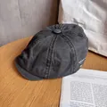 Detail view of charcoal gray washed canvas newsboy hat with OLB-STUDIO letter embroidery - M (55-59cm) / Gray