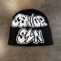 Close-up of black knit beanie featuring white Senior Szn graffiti jacquard lettering - M / Black
